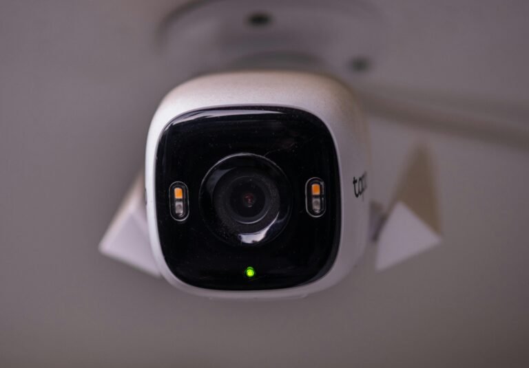 Detailed view of a modern security camera installed indoors