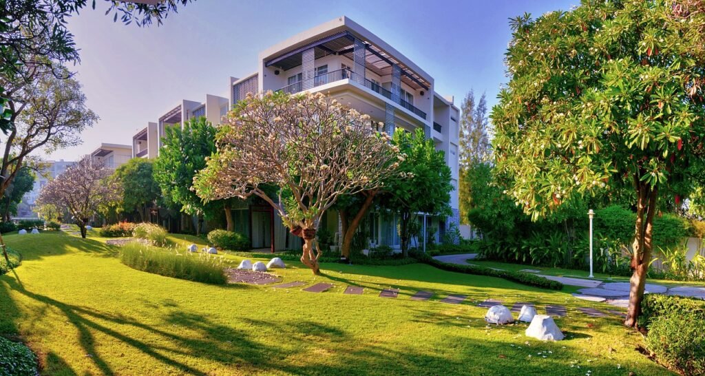 pool, leisure, tropical, nature, building, apartment, condo, business, sun, garden, summer, cityscape, outdoors, outdoor, modern, green, park, sky, house, architecture
